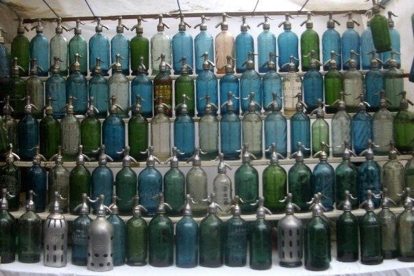 vintage soda bottles at the san telmo antiques market in buenos aires