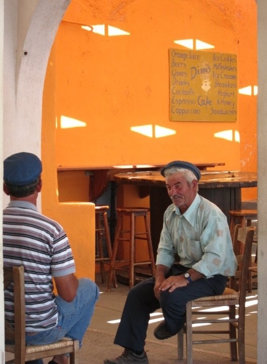 these guys run the donkey rides from the port to the cliff's edge in fira.