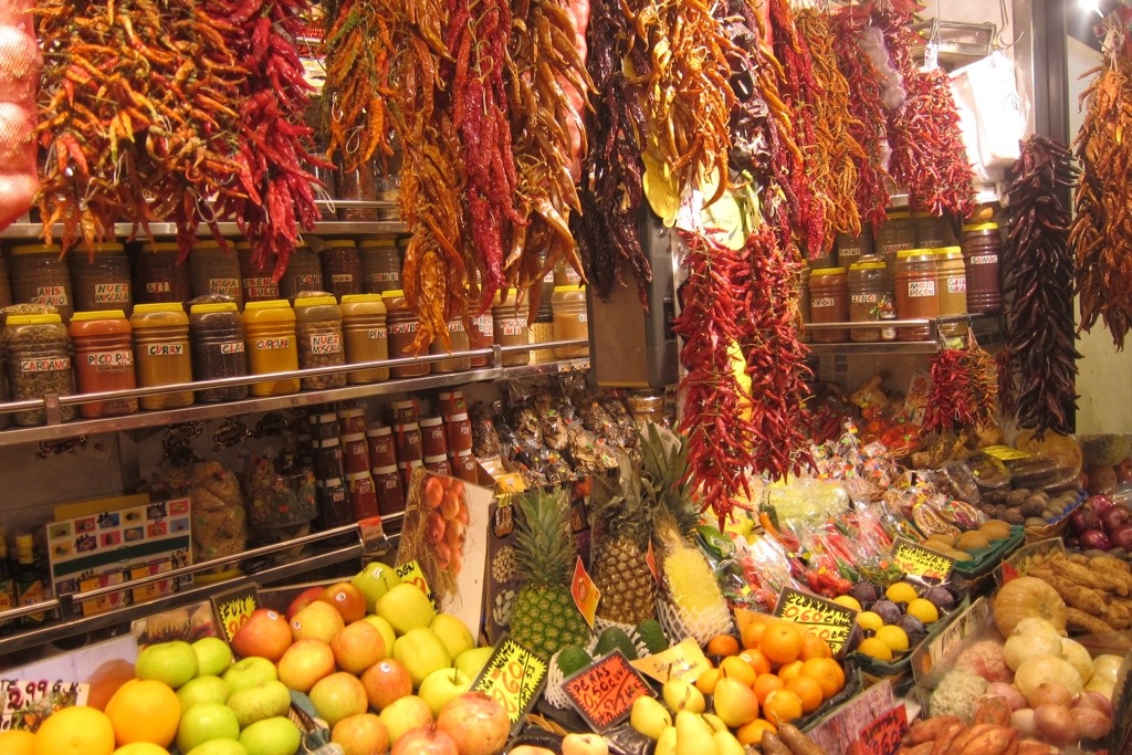 spices and chilies and fruits, oh my! at la boqueria in barcelona.