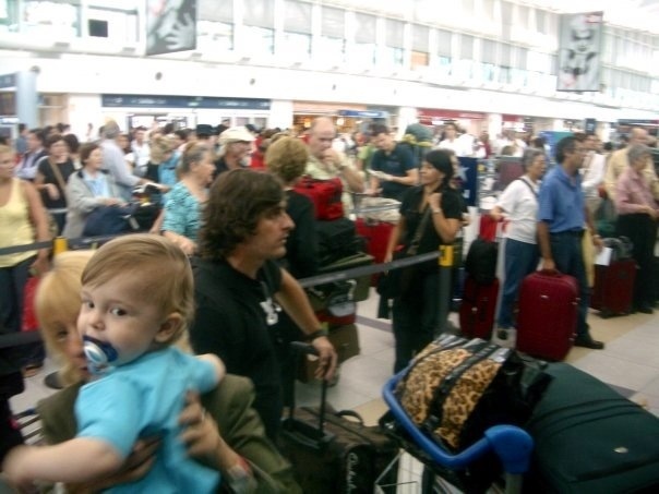 chaos at the airport in buenos aires after cancelled flighs, angry passengers, and flight crews who discussed the flight status in front of me, not knowing i understand spanish.