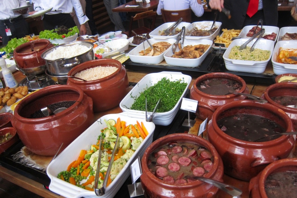 trying brazil's famous local feijoada with brazilian coworkers during a work trip to brazil last year