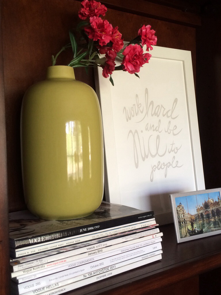 i (try to) buy a vogue in each country i visit, and display some of my favorites in my office bookcase, next to my framed postcard of venice (yes i framed a postcard - it was so magical!)