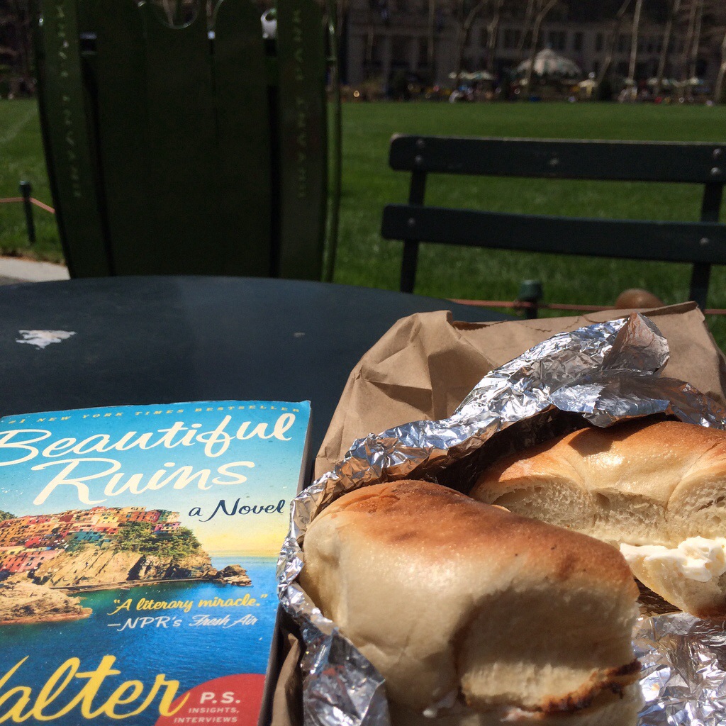 a bagel and a novel (thanks, bagel & schmear) during a quiet morning in bryant park