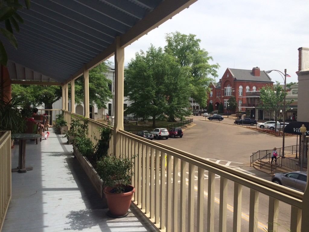 a view of the square in oxford, mississippi as seen from the balcony of square books store